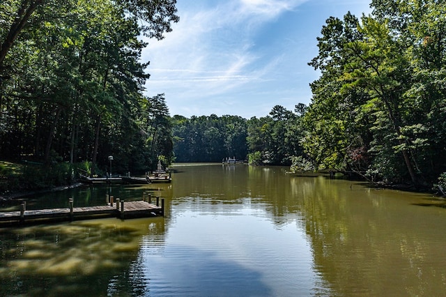 property view of water featuring a dock