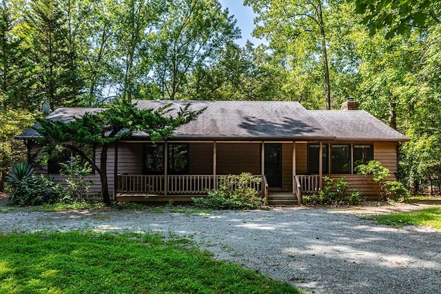 single story home with covered porch