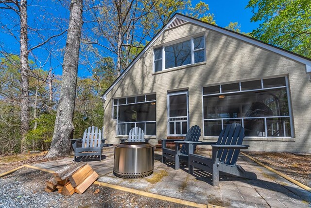 rear view of property with a patio