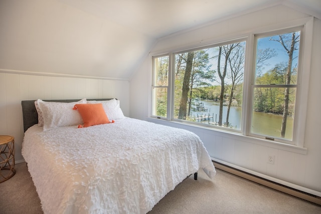 bedroom with a baseboard radiator, a water view, lofted ceiling, and carpet floors