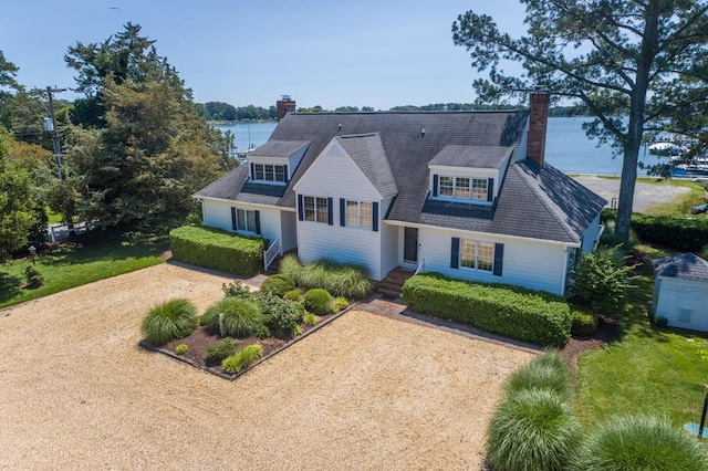 1032 Fishing Bay Rd, Deltaville, VA 23043 - view of front facade featuring a chimney and a water view