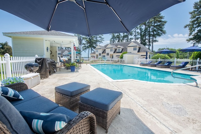 1032 Fishing Bay Rd, Deltaville, VA 23043 - community pool featuring a patio, a residential view, and a grill