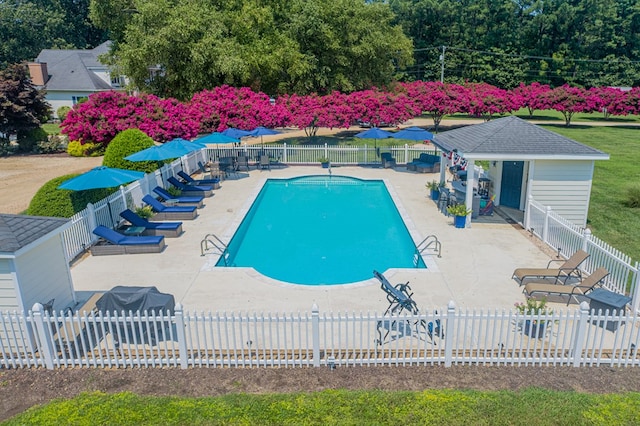 1032 Fishing Bay Rd, Deltaville, VA 23043 - community pool with a patio and an outbuilding