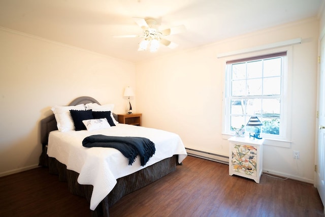 bedroom with wood finished floors, baseboards, baseboard heating, and ornamental molding