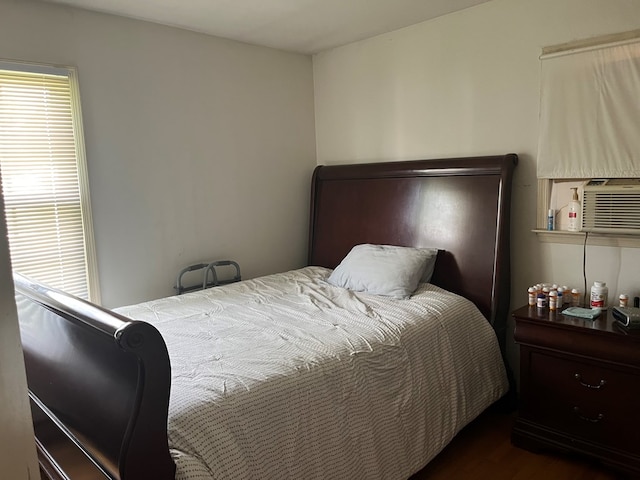 155 Rouzie Dr, Tappahannock, VA 22560 - bedroom with wood finished floors and cooling unit