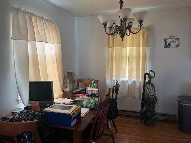155 Rouzie Dr, Tappahannock, VA 22560 - dining area with a chandelier and wood finished floors