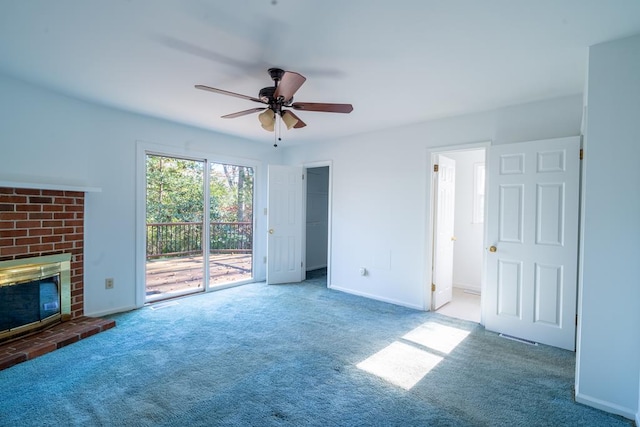 unfurnished living room featuring a fireplace, carpet flooring, and ceiling fan