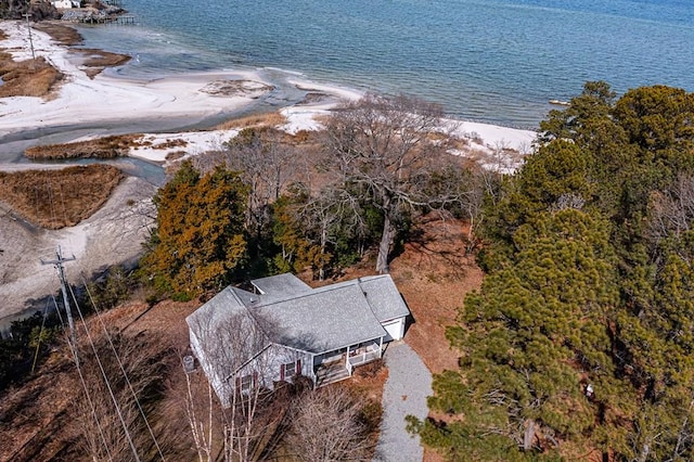 bird's eye view featuring a water view and a view of the beach