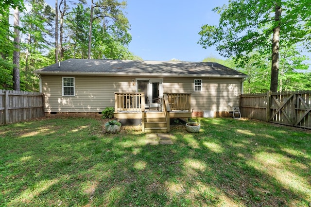 326 Chase St, Kilmarnock, VA 22482 - back of property with crawl space and a wooden deck