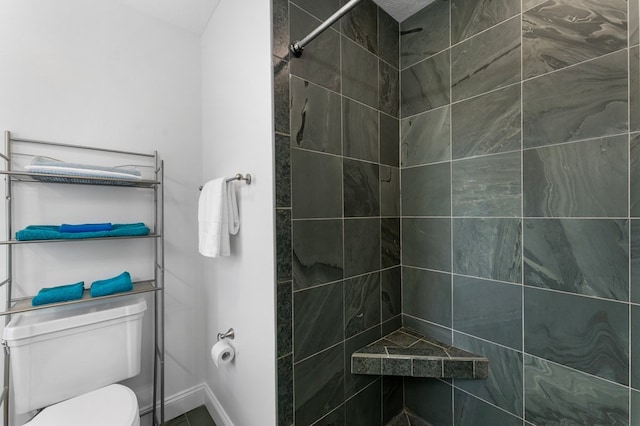 326 Chase St, Kilmarnock, VA 22482 - full bathroom featuring a tile shower, toilet, and baseboards