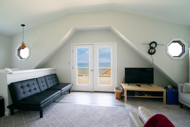 1150 Brammer Dr, Heathsville, VA 22473 - living area featuring healthy amount of natural light, lofted ceiling, french doors, and wood finished floors