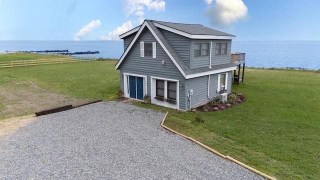 1150 Brammer Dr, Heathsville, VA 22473 - traditional-style house with a shingled roof, a water view, and central AC