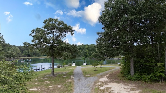 1150 Brammer Dr, Heathsville, VA 22473 - view of property's community with a water view, a boat dock, and a view of trees