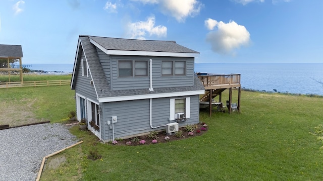 1150 Brammer Dr, Heathsville, VA 22473 - back of house with roof with shingles, a deck with water view, and ac unit