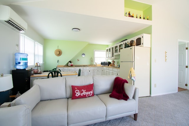 1150 Brammer Dr, Heathsville, VA 22473 - living area with a wall mounted air conditioner, light carpet, and baseboards