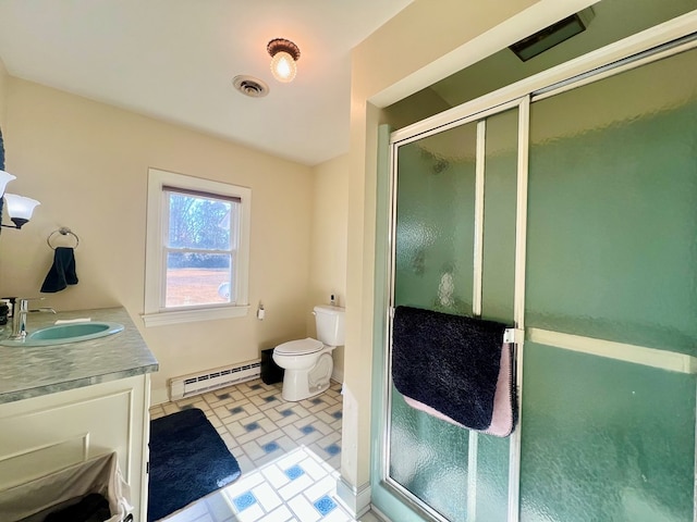 full bathroom featuring a baseboard radiator, toilet, vanity, visible vents, and a stall shower