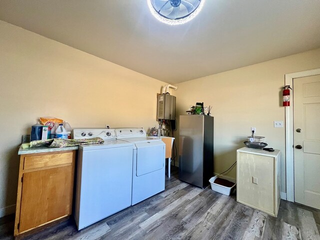 bathroom with vanity, a baseboard radiator, toilet, and an enclosed shower