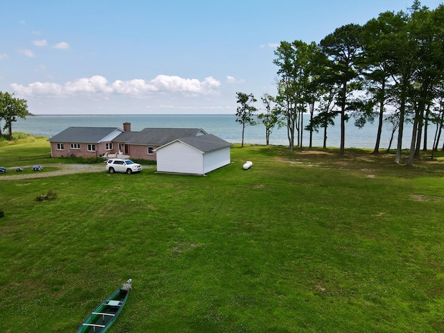 exterior space with a water view