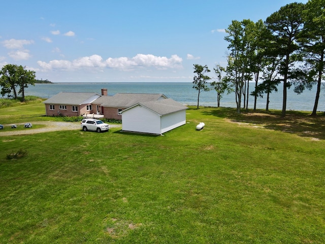 exterior space with a water view