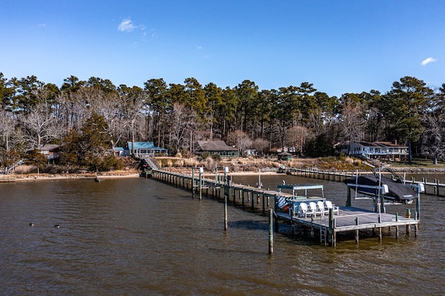 dock area featuring a water view and boat lift