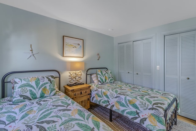 bedroom featuring two closets