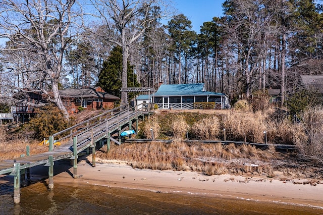 back of house with a water view