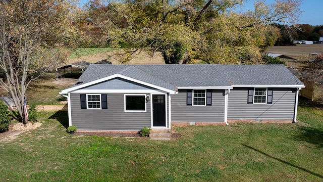 view of front facade with a front yard