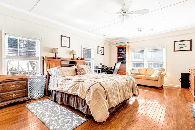 bedroom featuring hardwood / wood-style floors and ceiling fan