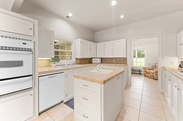 367 Edgewater Ln, Montross, VA 22520 - kitchen with white appliances, a sink, a warming drawer, tile countertops, and recessed lighting