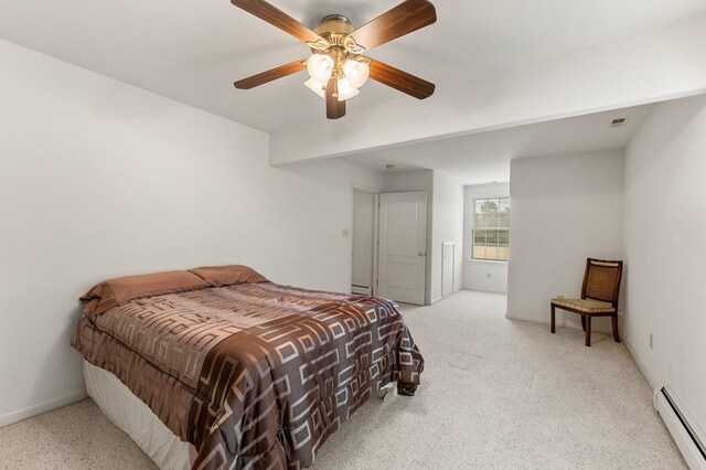 367 Edgewater Ln, Montross, VA 22520 - carpeted bedroom with baseboard heating, ceiling fan, and baseboards