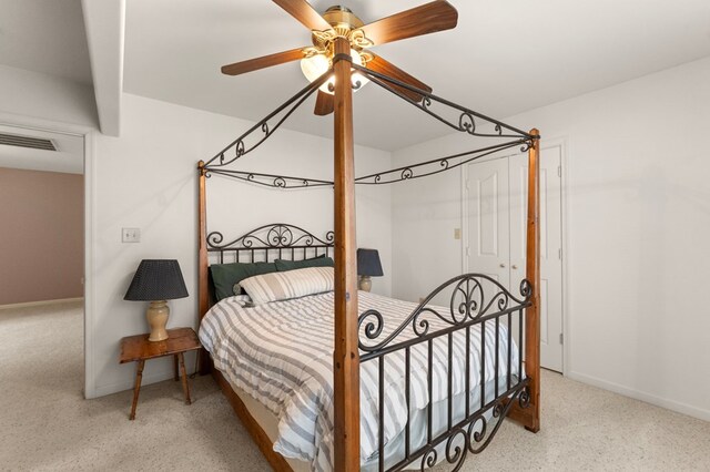 367 Edgewater Ln, Montross, VA 22520 - bedroom featuring baseboards, speckled floor, and ceiling fan