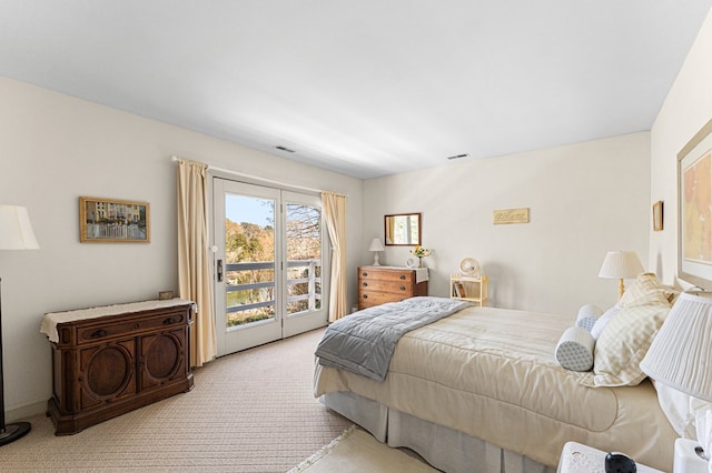 269 The Ln, Irvington, VA 22480 - carpeted bedroom featuring access to exterior