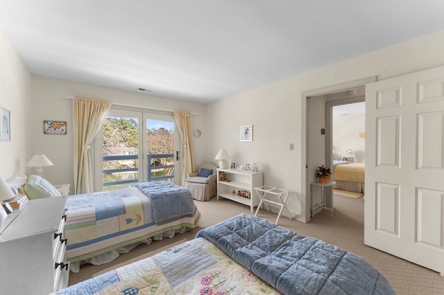 carpeted bedroom with visible vents