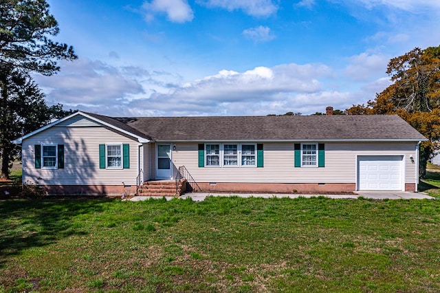 ranch-style home with a garage and a front yard