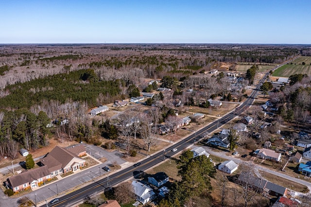 bird's eye view featuring a view of trees