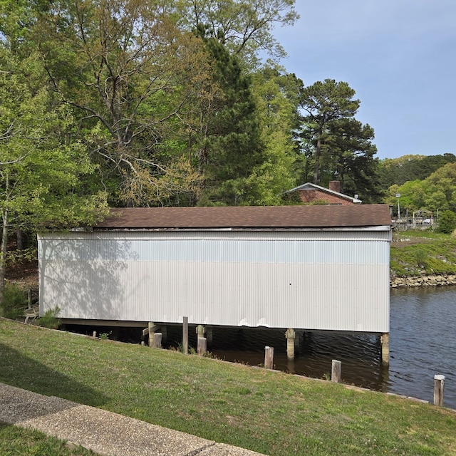 exterior space with a water view