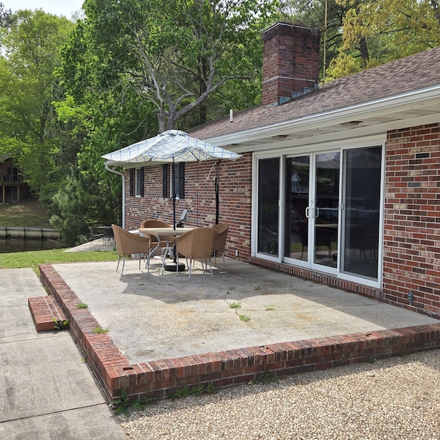 view of patio featuring outdoor dining space