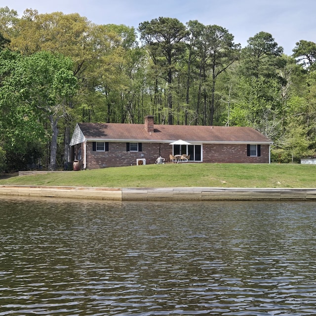 exterior space featuring a view of trees