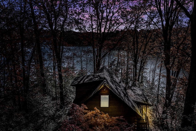 view of property exterior at dusk