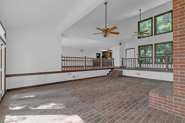 1061 Twiggs Ferry Rd, Hartfield, VA 23071 - unfurnished living room featuring brick flooring and a ceiling fan