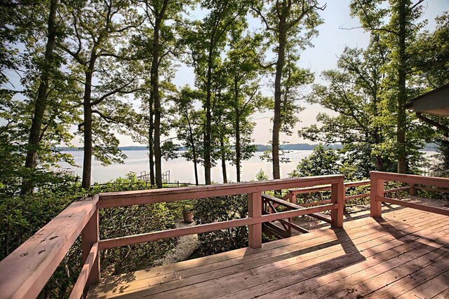 1061 Twiggs Ferry Rd, Hartfield, VA 23071 - wooden deck featuring a water view