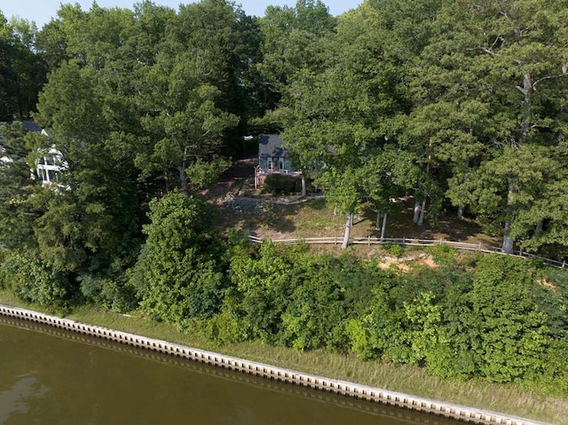 1061 Twiggs Ferry Rd, Hartfield, VA 23071 - aerial view of property's location featuring a nearby body of water and a forest