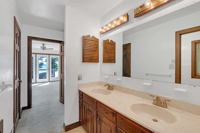 1061 Twiggs Ferry Rd, Hartfield, VA 23071 - bathroom featuring double vanity and baseboards