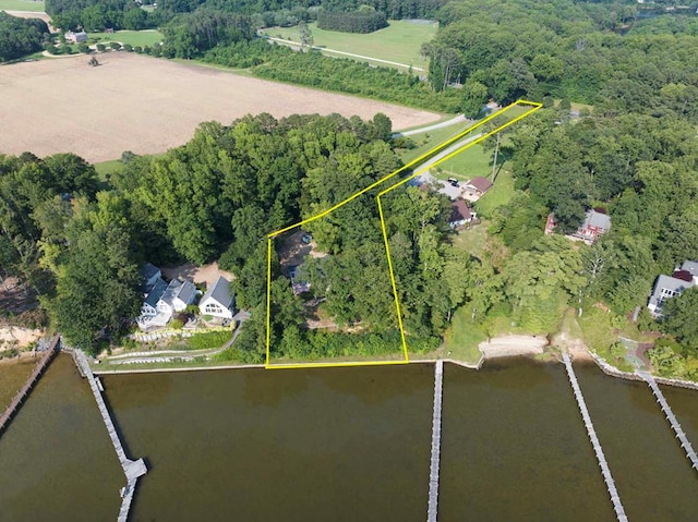 1061 Twiggs Ferry Rd, Hartfield, VA 23071 - aerial view of property and surrounding area featuring a large body of water and property parcel outlined