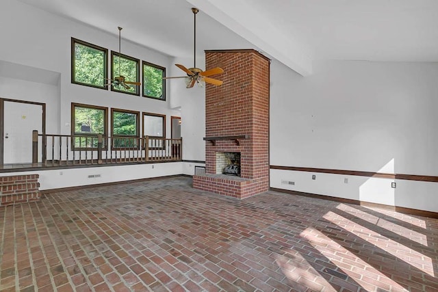1061 Twiggs Ferry Rd, Hartfield, VA 23071 - unfurnished living room with ceiling fan, brick flooring, a towering ceiling, and a brick fireplace