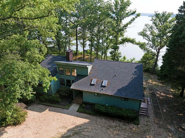 1061 Twiggs Ferry Rd, Hartfield, VA 23071 - view of front facade featuring a shingled roof and a chimney