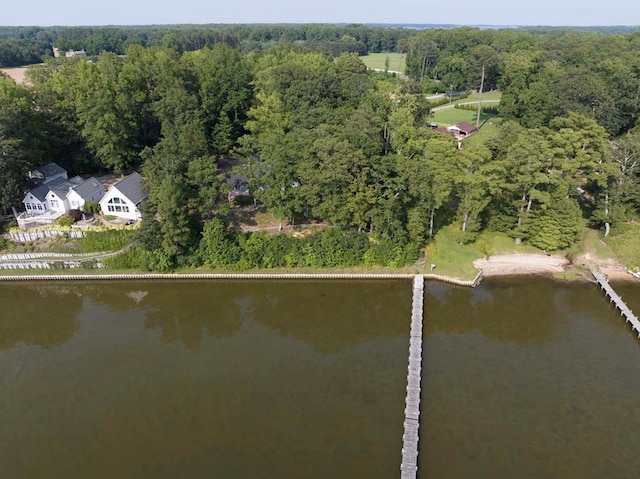 1061 Twiggs Ferry Rd, Hartfield, VA 23071 - aerial overview of property's location featuring a nearby body of water and a heavily wooded area