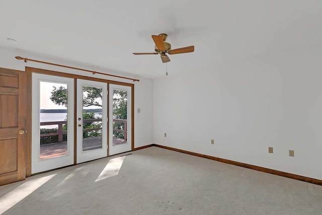 1061 Twiggs Ferry Rd, Hartfield, VA 23071 - empty room with carpet flooring and a ceiling fan