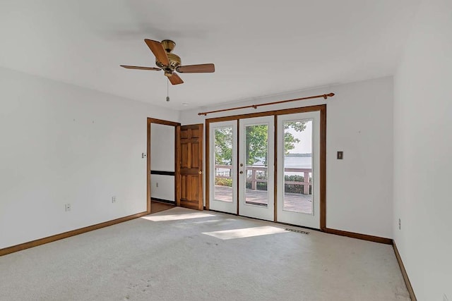 1061 Twiggs Ferry Rd, Hartfield, VA 23071 - unfurnished room featuring carpet and a ceiling fan