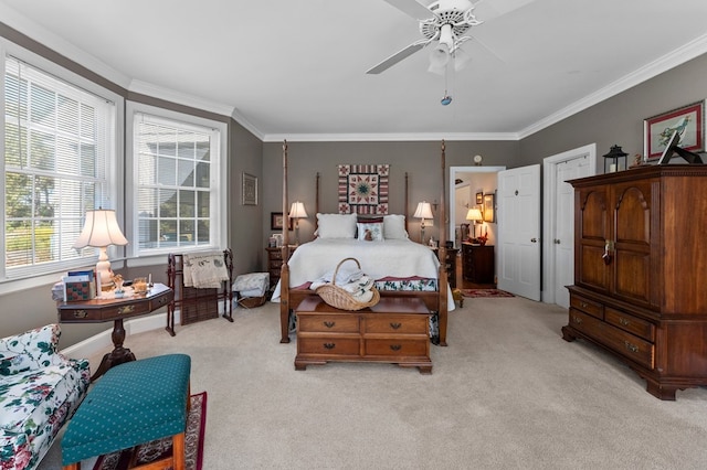 bedroom with light carpet, ceiling fan, and ornamental molding